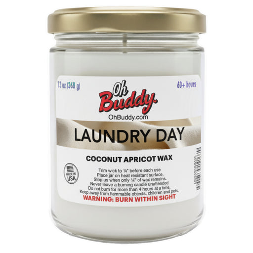Jar of 'Laundry Day' candle with 'Oh Buddy' branding on a white background