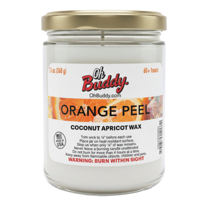 Candle jar labeled 'Oh Buddy Orange Peel' with a gold lid on a white background