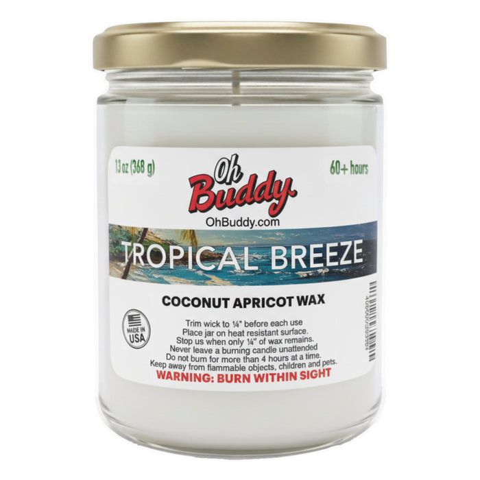 Candle jar labeled 'Tropical Breeze' with 'Oh Buddy' branding on a white background