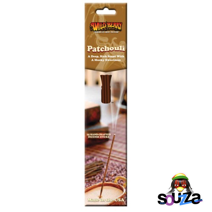 Packaging of Wild Berry Patchouli incense with a picture of the incense sticks and the product name visible. The background suggests a natural or outdoor setting.